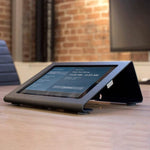 Heckler Meeting Room Console securing iPad devices for Zoom Rooms and video conferencing.