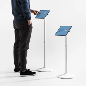 Freestanding floor stand for tablets with tilt adjustment and secure display housing