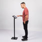 Person using VESA Swift Floor Stand 