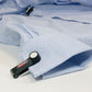 Forstag Ink Tag securely attached to a long sleeve shirt without damaging fabric.