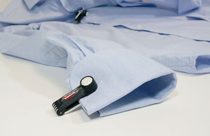 Forstag Ink Tag securely attached to a long sleeve shirt without damaging fabric.