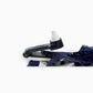 Innovative Forstag Ink Tag hanging safely on a bra strap with quick-release mechanism.