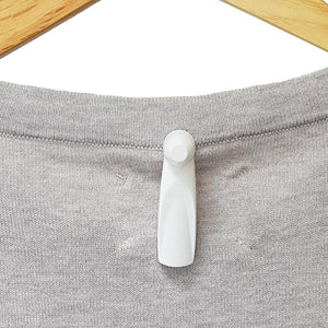 Durable white pencil security tag with AM 8.2 MHz frequency for retail protection compatible with Sensormatic