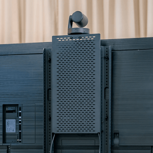 Heckler Device Panel XL with flip-down design for easy access to power strips and cable connections.