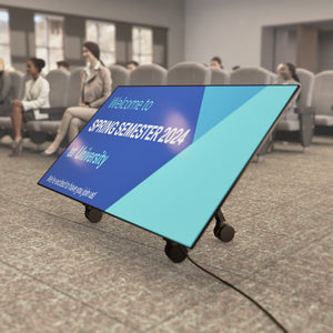 Mobile Heckler Confidence Stand with 4-inch locking casters for stable use in events and presentations.
