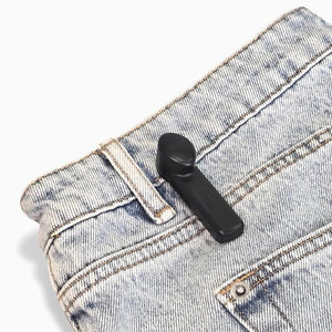 MiTag Pencil with Pin attached to jeans – secure anti-theft tag designed for apparel and denim protection