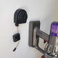 Alarming tether for securing handbags in retail stores