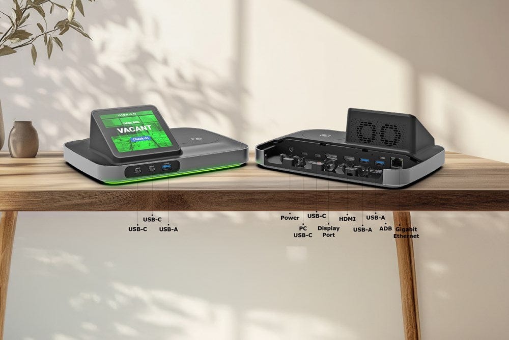Smart desk setup with integrated cable management using Qbic BookBuddy Connect.