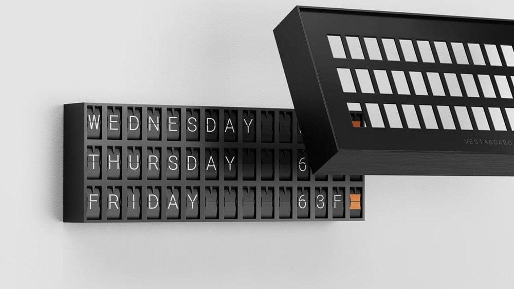 Vestaboard Note displaying weekdays in a modern workspace
