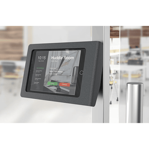 Heckler iPad wall mount securely installed on drywall for room scheduling and digital signage.